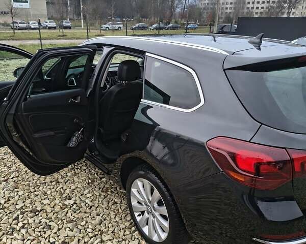 Черный Опель Астра, объемом двигателя 2 л и пробегом 175 тыс. км за 8300 $, фото 17 на Automoto.ua