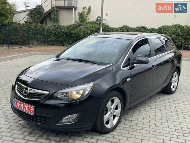 Черный Опель Астра, объемом двигателя 1.6 л и пробегом 125 тыс. км за 7450 $, фото 1 на Automoto.ua