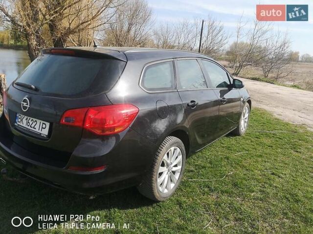 Черный Опель Астра, объемом двигателя 1.36 л и пробегом 229 тыс. км за 6500 $, фото 4 на Automoto.ua