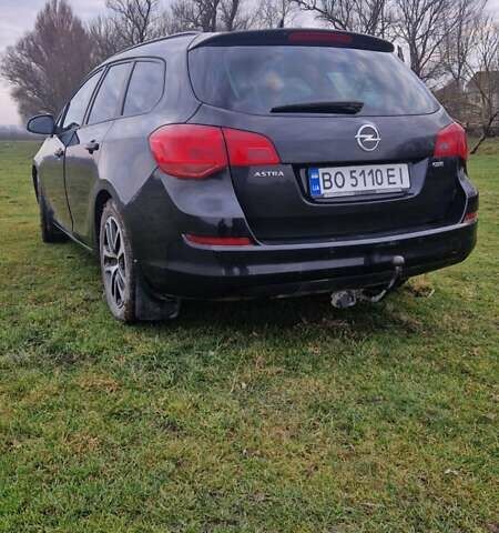 Черный Опель Астра, объемом двигателя 1.7 л и пробегом 200 тыс. км за 7200 $, фото 4 на Automoto.ua