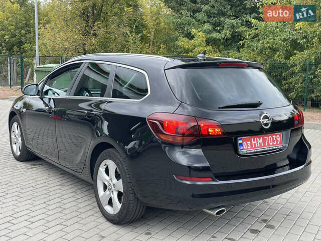 Черный Опель Астра, объемом двигателя 1.6 л и пробегом 125 тыс. км за 7450 $, фото 16 на Automoto.ua