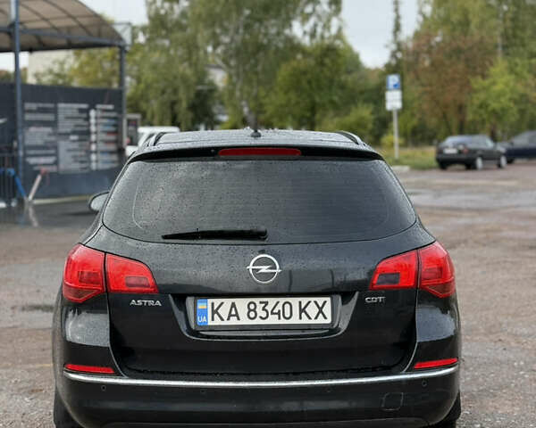Черный Опель Астра, объемом двигателя 1.7 л и пробегом 300 тыс. км за 6150 $, фото 5 на Automoto.ua