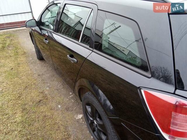 Черный Опель Астра, объемом двигателя 1.69 л и пробегом 260 тыс. км за 5600 $, фото 9 на Automoto.ua