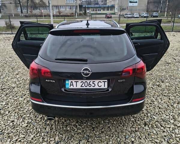 Черный Опель Астра, объемом двигателя 2 л и пробегом 175 тыс. км за 8300 $, фото 19 на Automoto.ua