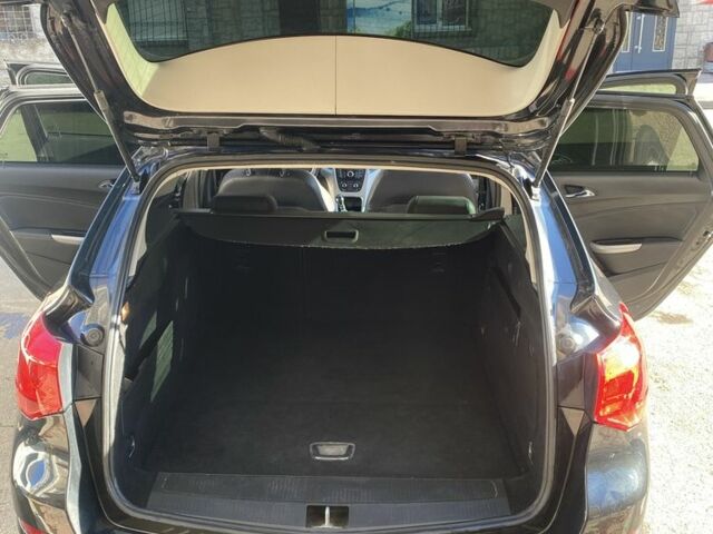 Черный Опель Астра, объемом двигателя 1.7 л и пробегом 260 тыс. км за 7500 $, фото 16 на Automoto.ua