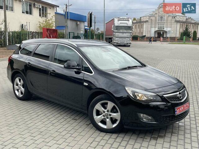 Черный Опель Астра, объемом двигателя 1.6 л и пробегом 125 тыс. км за 7450 $, фото 19 на Automoto.ua