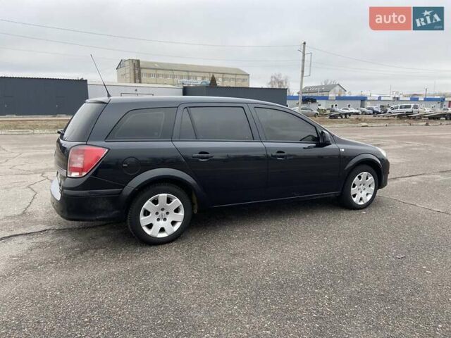 Чорний Опель Астра, об'ємом двигуна 1.6 л та пробігом 331 тис. км за 6450 $, фото 7 на Automoto.ua