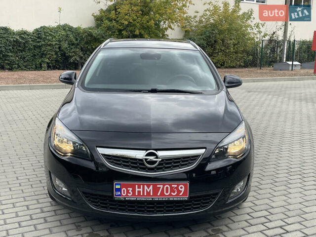 Черный Опель Астра, объемом двигателя 1.6 л и пробегом 125 тыс. км за 7450 $, фото 6 на Automoto.ua