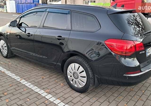 Черный Опель Астра, объемом двигателя 1.7 л и пробегом 267 тыс. км за 7199 $, фото 9 на Automoto.ua