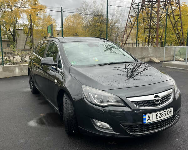 Черный Опель Астра, объемом двигателя 1.7 л и пробегом 275 тыс. км за 7400 $, фото 4 на Automoto.ua