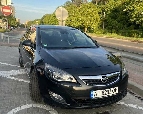 Черный Опель Астра, объемом двигателя 1.7 л и пробегом 275 тыс. км за 7400 $, фото 20 на Automoto.ua