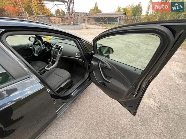 Черный Опель Астра, объемом двигателя 1.2 л и пробегом 258 тыс. км за 6200 $, фото 12 на Automoto.ua