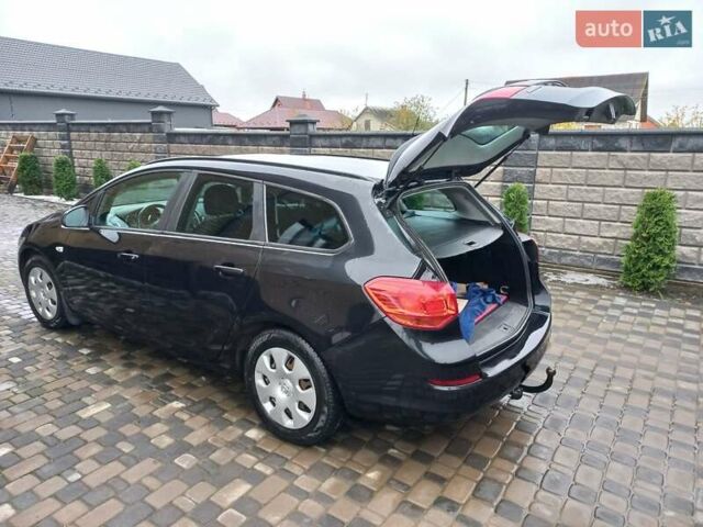 Черный Опель Астра, объемом двигателя 1.7 л и пробегом 185 тыс. км за 6650 $, фото 5 на Automoto.ua