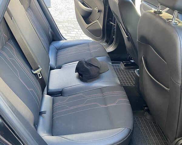 Черный Опель Астра, объемом двигателя 1.7 л и пробегом 260 тыс. км за 7500 $, фото 15 на Automoto.ua