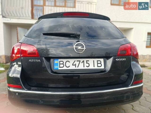 Черный Опель Астра, объемом двигателя 1.69 л и пробегом 230 тыс. км за 8000 $, фото 13 на Automoto.ua