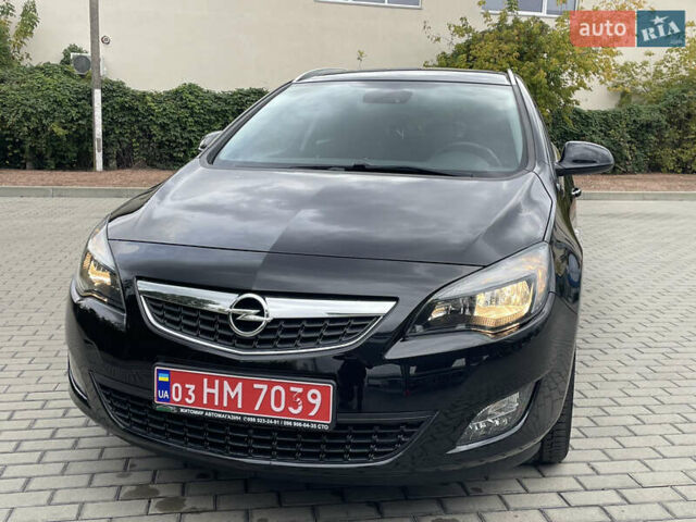 Черный Опель Астра, объемом двигателя 1.6 л и пробегом 125 тыс. км за 7450 $, фото 3 на Automoto.ua