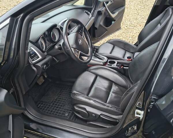 Черный Опель Астра, объемом двигателя 2 л и пробегом 175 тыс. км за 8300 $, фото 13 на Automoto.ua