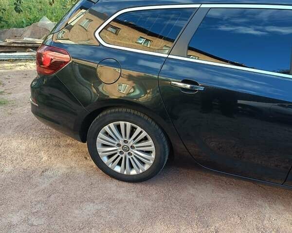 Черный Опель Астра, объемом двигателя 1.7 л и пробегом 250 тыс. км за 7200 $, фото 18 на Automoto.ua