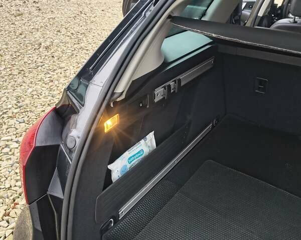 Черный Опель Астра, объемом двигателя 2 л и пробегом 175 тыс. км за 8300 $, фото 9 на Automoto.ua