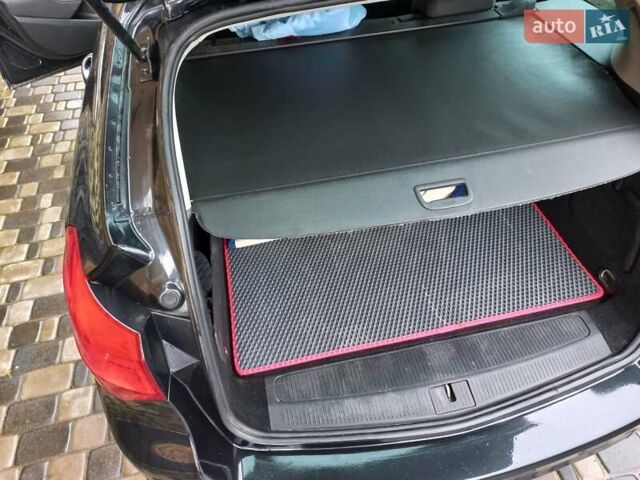 Черный Опель Астра, объемом двигателя 1.7 л и пробегом 185 тыс. км за 6650 $, фото 13 на Automoto.ua