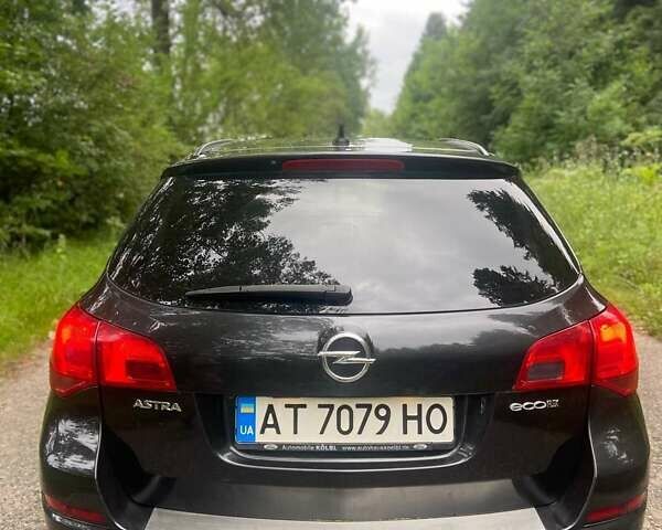 Черный Опель Астра, объемом двигателя 1.3 л и пробегом 284 тыс. км за 5950 $, фото 2 на Automoto.ua