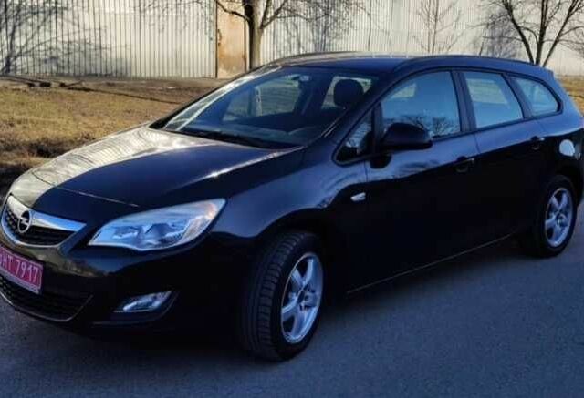 Черный Опель Астра, объемом двигателя 1.4 л и пробегом 195 тыс. км за 6300 $, фото 1 на Automoto.ua