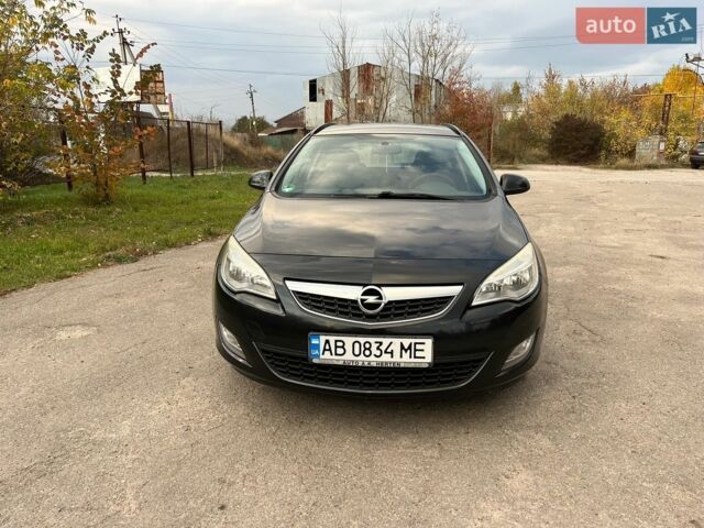 Черный Опель Астра, объемом двигателя 1.2 л и пробегом 258 тыс. км за 6200 $, фото 2 на Automoto.ua