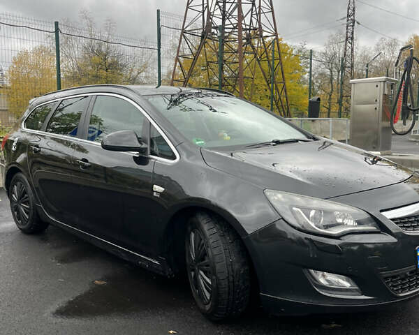 Черный Опель Астра, объемом двигателя 1.7 л и пробегом 275 тыс. км за 7400 $, фото 18 на Automoto.ua