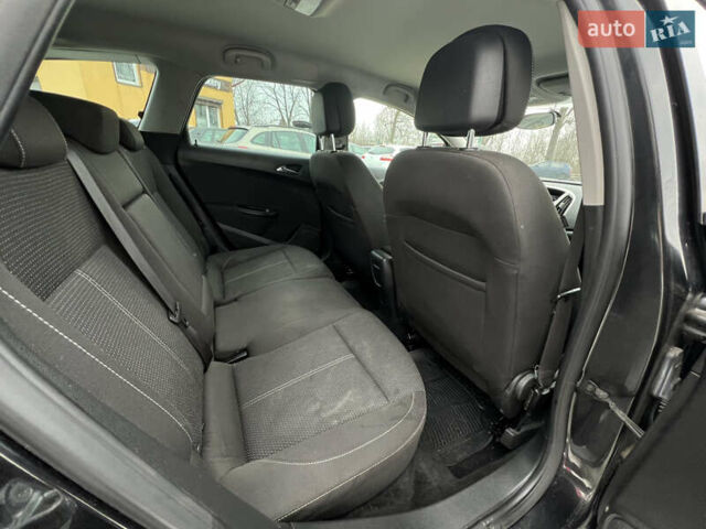 Черный Опель Астра, объемом двигателя 1.4 л и пробегом 229 тыс. км за 6499 $, фото 29 на Automoto.ua