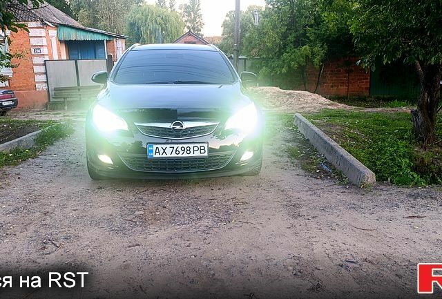 Черный Опель Астра, объемом двигателя 1.3 л и пробегом 235 тыс. км за 5999 $, фото 3 на Automoto.ua