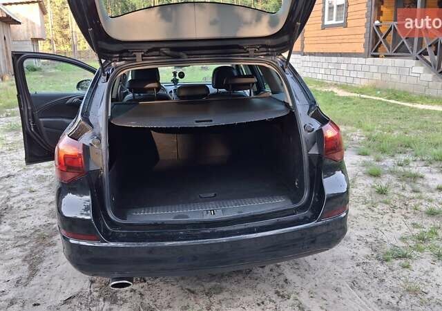 Черный Опель Астра, объемом двигателя 1.96 л и пробегом 241 тыс. км за 7300 $, фото 2 на Automoto.ua