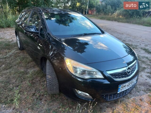 Черный Опель Астра, объемом двигателя 1.25 л и пробегом 232 тыс. км за 7200 $, фото 22 на Automoto.ua