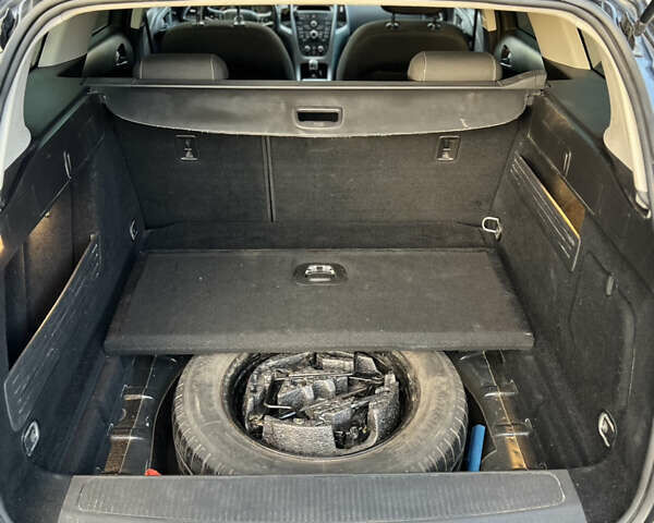 Черный Опель Астра, объемом двигателя 1.69 л и пробегом 300 тыс. км за 6499 $, фото 11 на Automoto.ua
