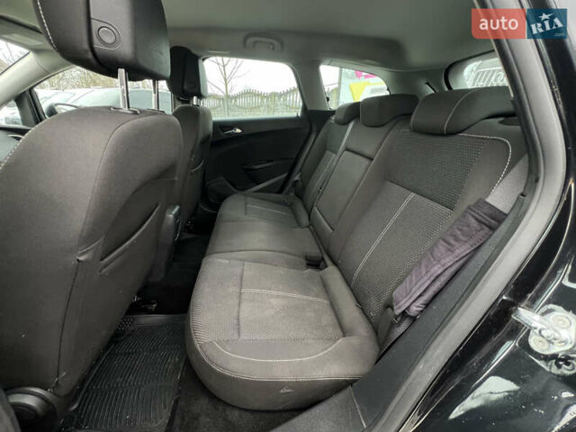 Черный Опель Астра, объемом двигателя 1.4 л и пробегом 229 тыс. км за 6499 $, фото 32 на Automoto.ua