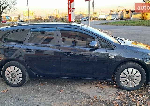 Черный Опель Астра, объемом двигателя 1.7 л и пробегом 267 тыс. км за 7199 $, фото 2 на Automoto.ua