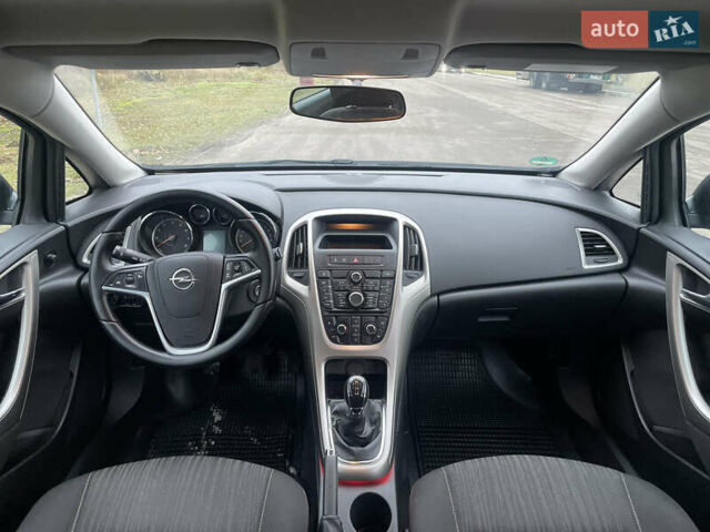 Черный Опель Астра, объемом двигателя 1.4 л и пробегом 210 тыс. км за 5900 $, фото 17 на Automoto.ua