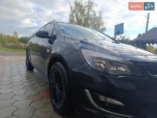 Черный Опель Астра, объемом двигателя 1.69 л и пробегом 230 тыс. км за 8000 $, фото 17 на Automoto.ua