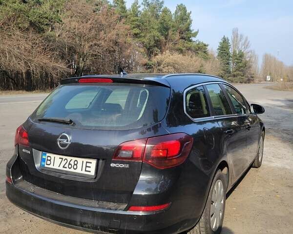 Черный Опель Астра, объемом двигателя 1.3 л и пробегом 171 тыс. км за 6999 $, фото 6 на Automoto.ua