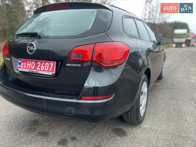 Черный Опель Астра, объемом двигателя 1.4 л и пробегом 210 тыс. км за 5900 $, фото 10 на Automoto.ua