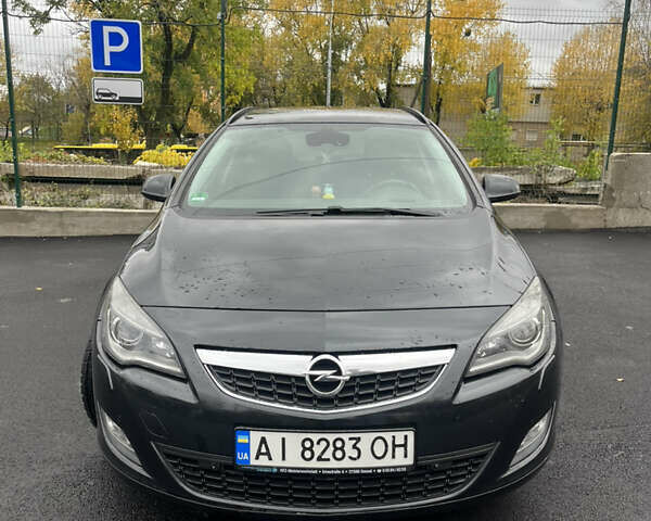 Черный Опель Астра, объемом двигателя 1.7 л и пробегом 275 тыс. км за 7400 $, фото 3 на Automoto.ua