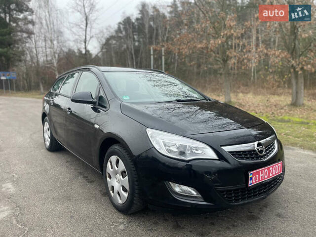 Черный Опель Астра, объемом двигателя 1.4 л и пробегом 210 тыс. км за 5900 $, фото 1 на Automoto.ua