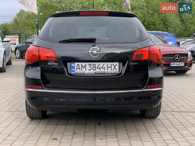 Черный Опель Астра, объемом двигателя 1.7 л и пробегом 234 тыс. км за 8599 $, фото 16 на Automoto.ua