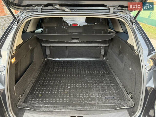 Черный Опель Астра, объемом двигателя 1.7 л и пробегом 258 тыс. км за 6999 $, фото 61 на Automoto.ua