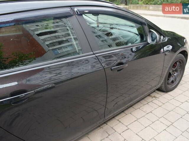 Черный Опель Астра, объемом двигателя 1.69 л и пробегом 222 тыс. км за 7500 $, фото 4 на Automoto.ua