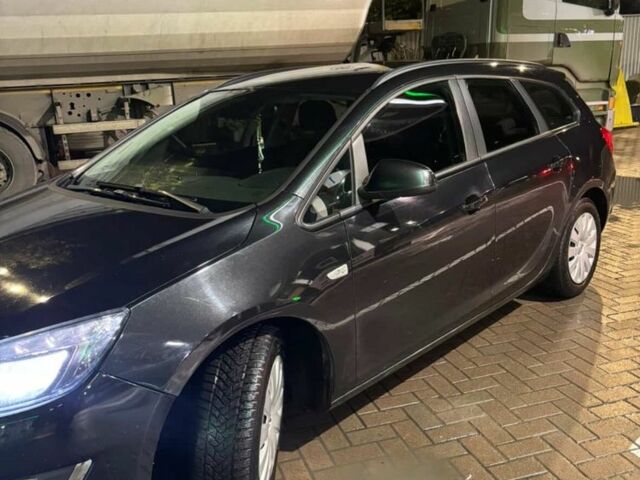 Черный Опель Астра, объемом двигателя 1.7 л и пробегом 275 тыс. км за 7600 $, фото 1 на Automoto.ua