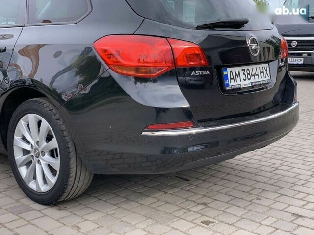 Черный Опель Астра, объемом двигателя 1.7 л и пробегом 234 тыс. км за 7855 $, фото 19 на Automoto.ua