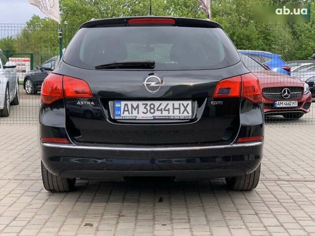 Черный Опель Астра, объемом двигателя 1.7 л и пробегом 234 тыс. км за 7855 $, фото 15 на Automoto.ua