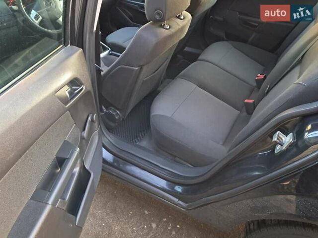 Черный Опель Астра, объемом двигателя 1.6 л и пробегом 318 тыс. км за 5400 $, фото 4 на Automoto.ua
