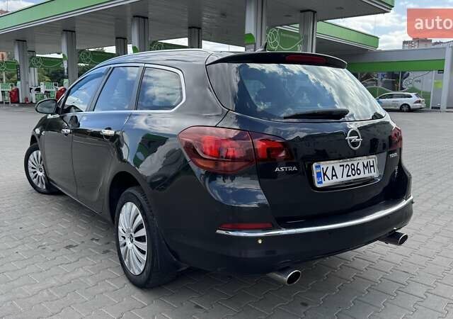 Черный Опель Астра, объемом двигателя 1.36 л и пробегом 250 тыс. км за 7500 $, фото 8 на Automoto.ua
