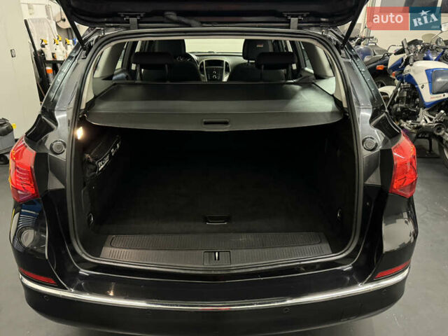 Черный Опель Астра, объемом двигателя 1.4 л и пробегом 203 тыс. км за 7250 $, фото 9 на Automoto.ua